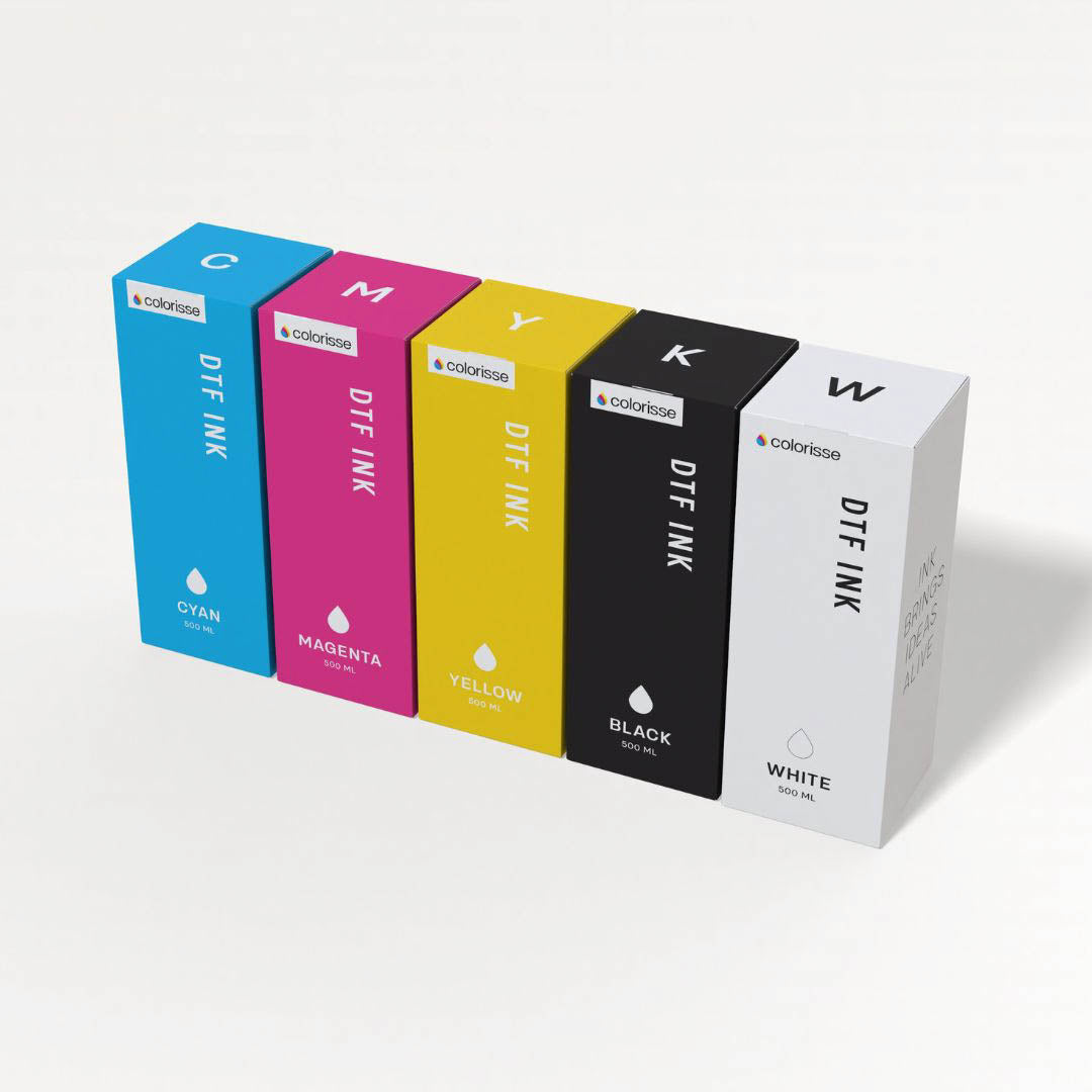 Colorisse DTF ink bottles in cyan, magenta, yellow, black, and white for bright, fade-resistant printing.